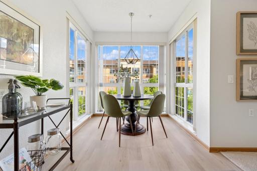 The perfect place for morning coffee w/ nearly floor to ceiling windows!