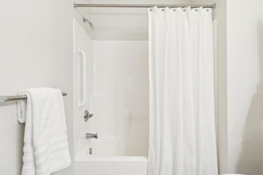 Both baths are equipped with grab bars in the tub & shower spaces.