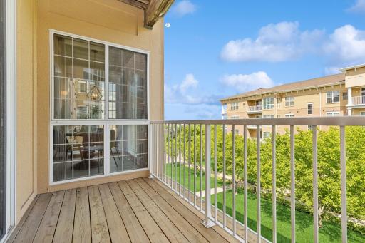 Fresh air & beautiful views on this spacious deck accessed through the living room!