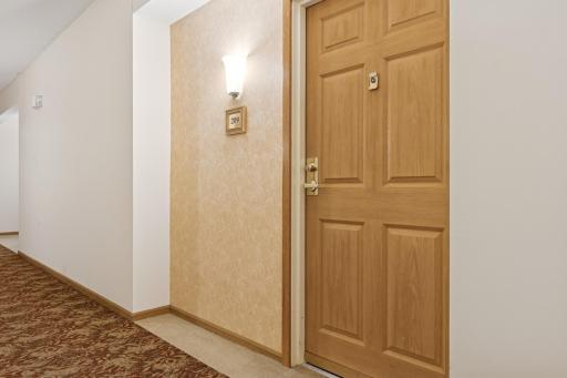Quiet building location for Unit 209 as it's between a stairwell & storage bay.