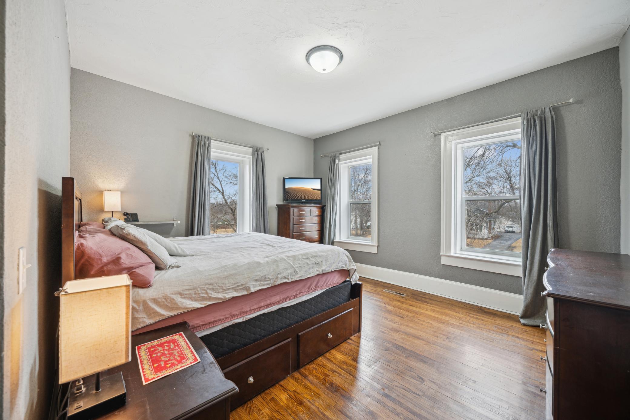 Gracious light filled owner's suite with gleaming hardwood floors! Walk in closet off the owner's bathroom. Plus there's an additional closet in the room.