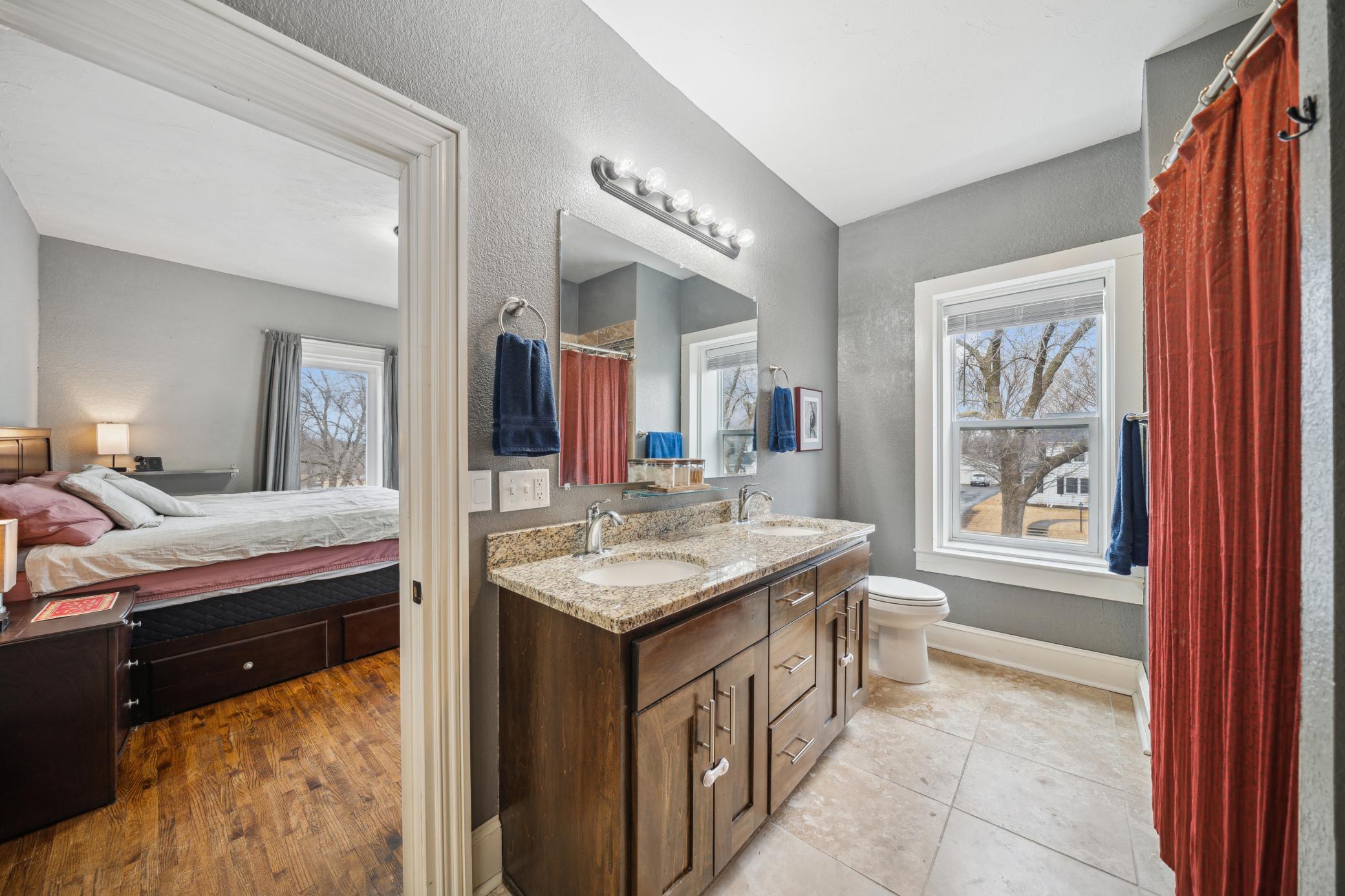 Spacious owners full bath with high cabinets, double sink, granite countertops,
tiled floors and a large linen cabinet for all your toiletries and towels!
