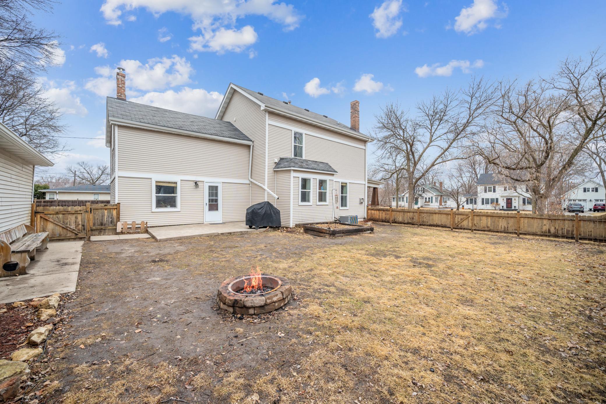 Huge yard with new privacy fence--enjoy your evenings around the firepit!