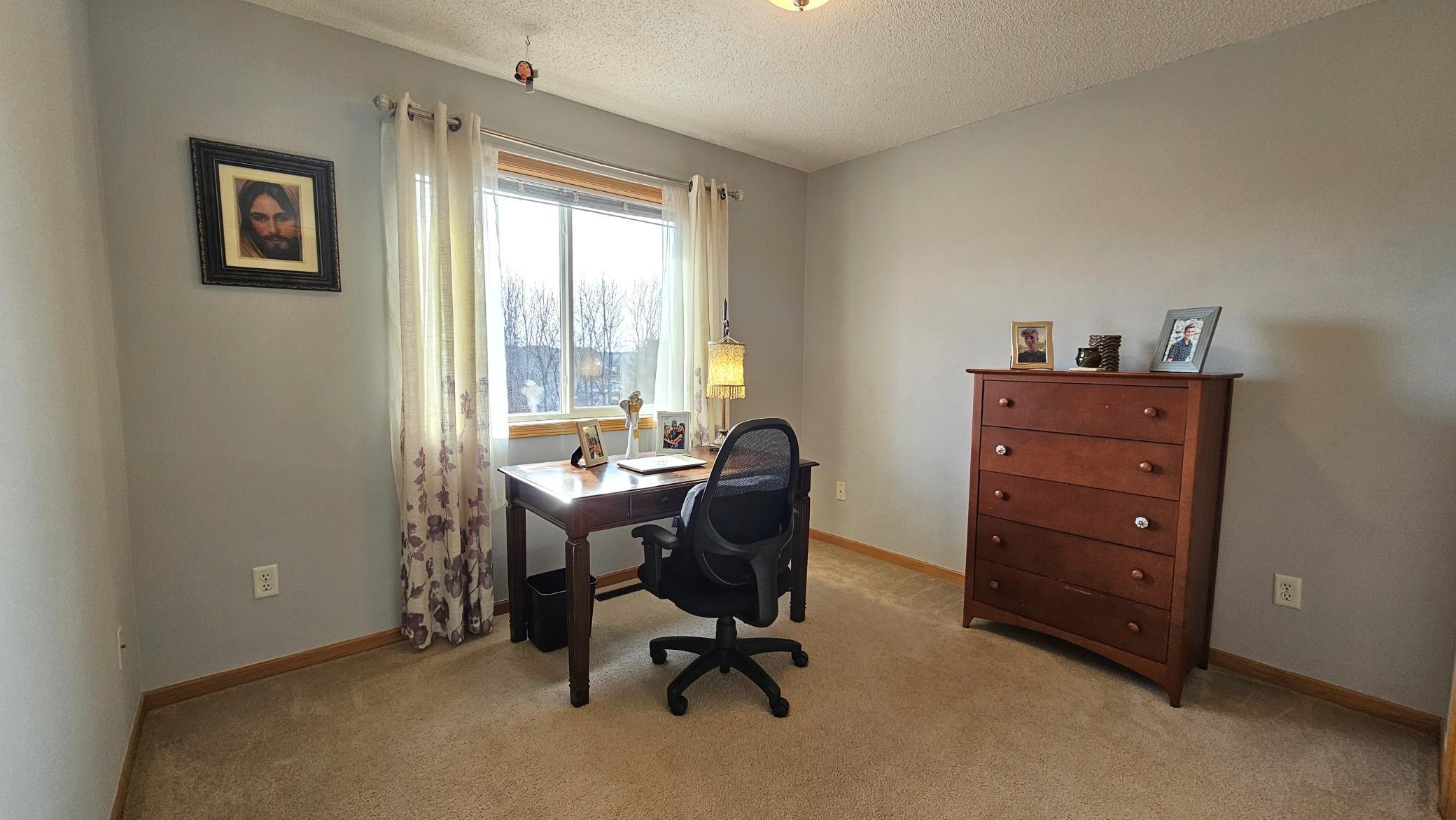Third bed on upper level could double as an additional office.