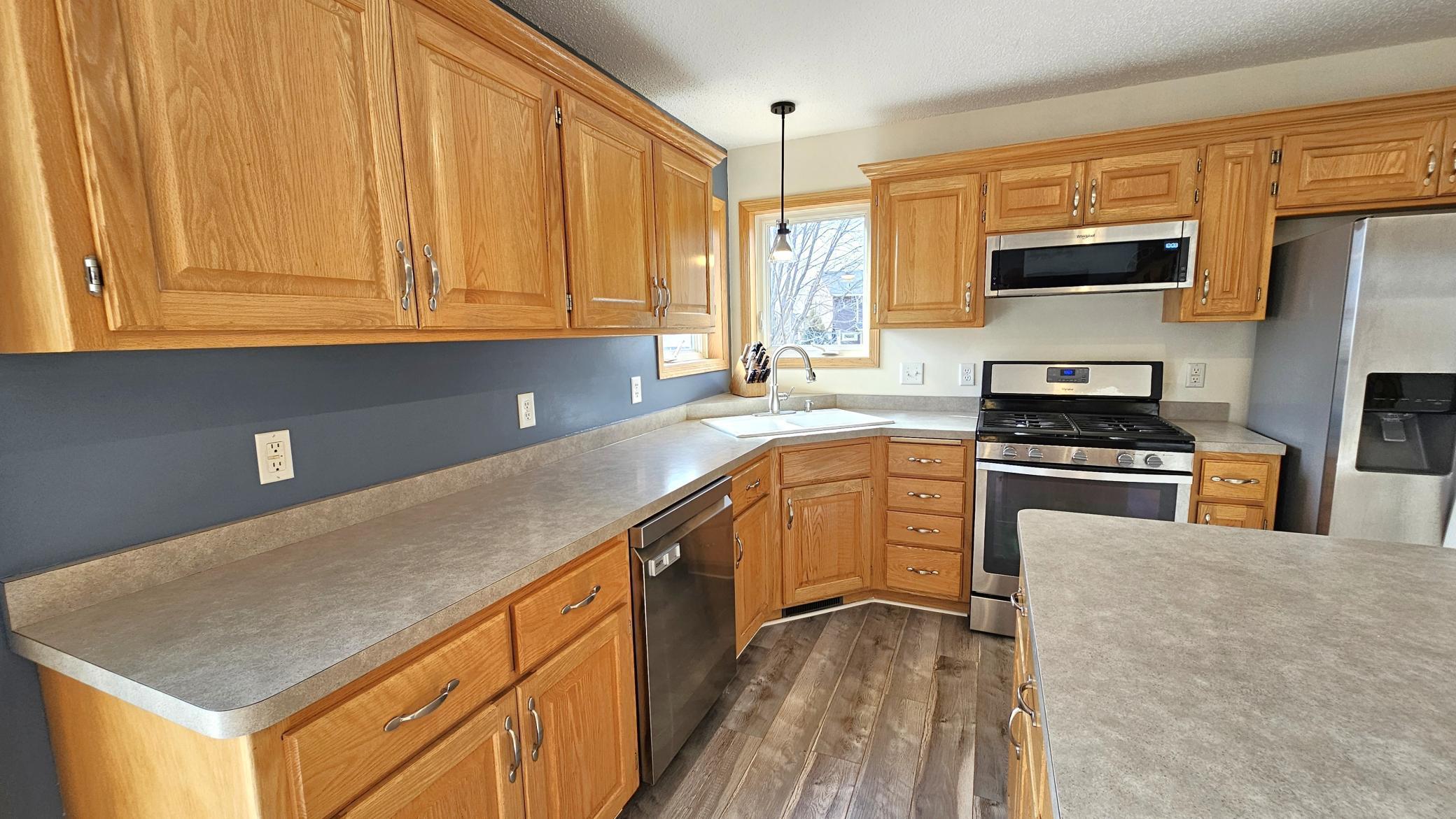 Corner window above sink.