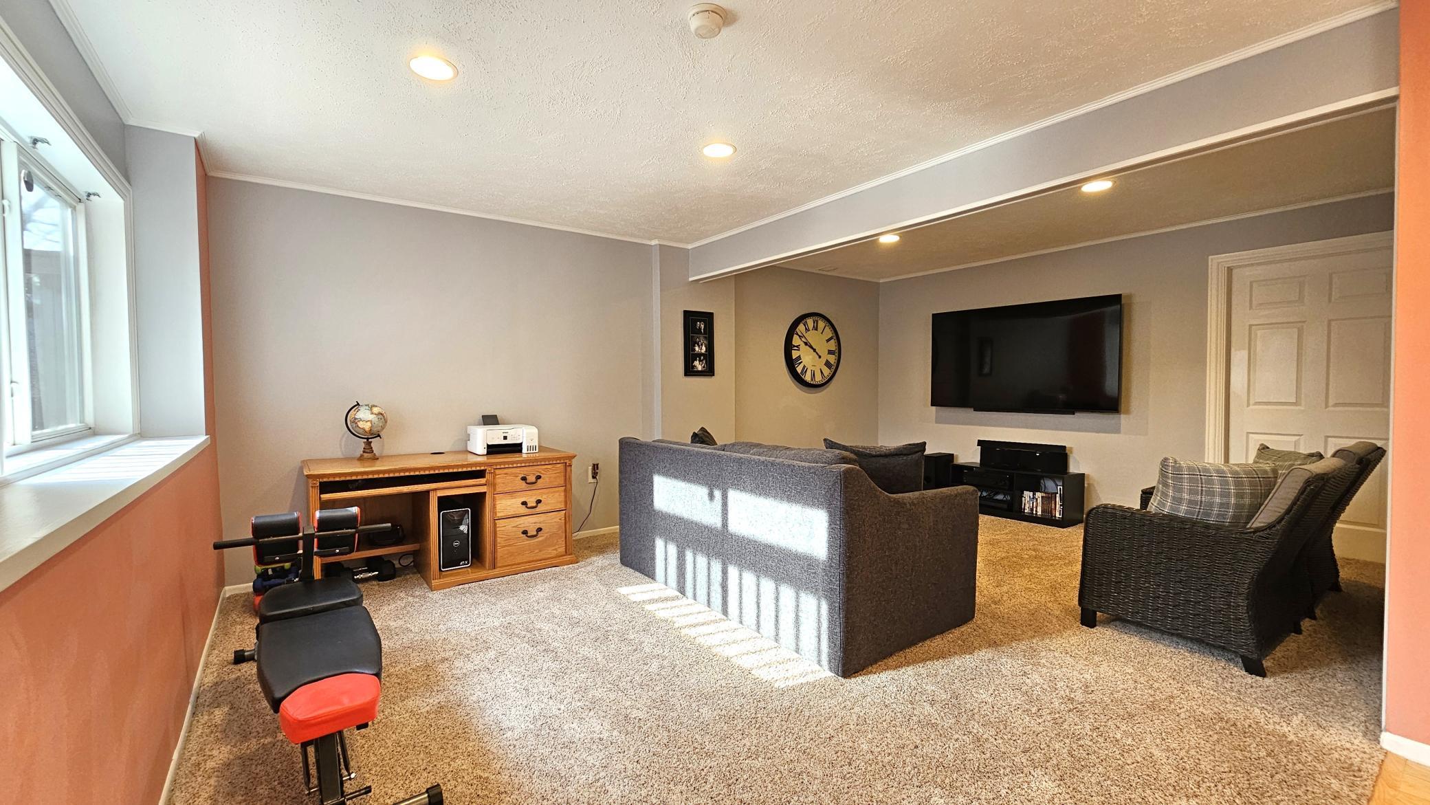 Spacious lower level family room.