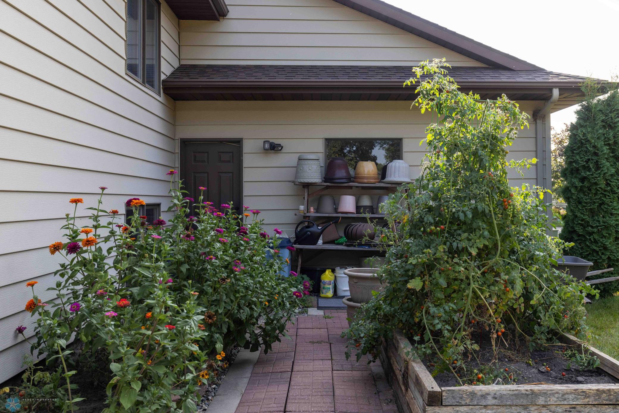 Backyard entrance to garage.