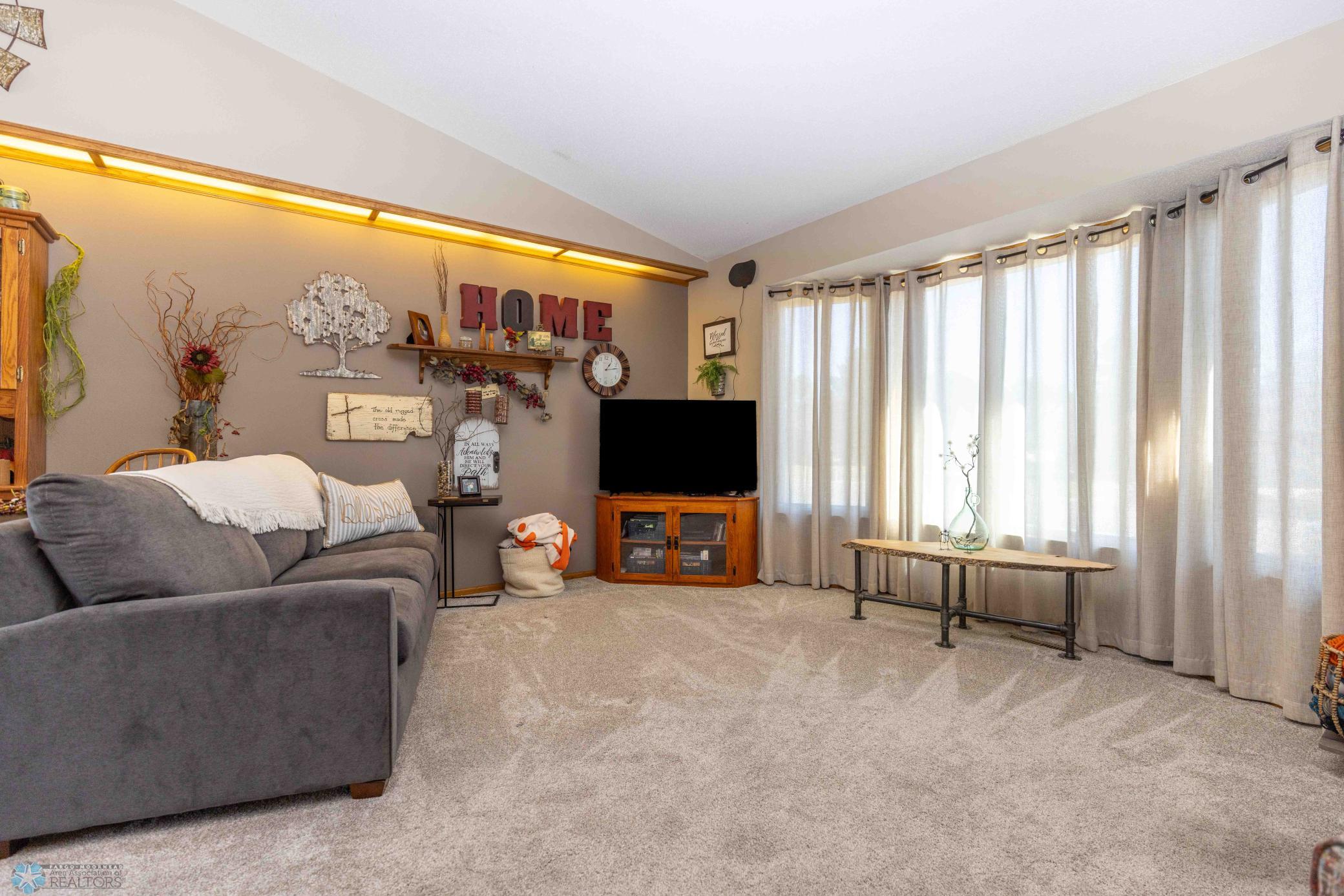 Living room and upper level with all new carpet