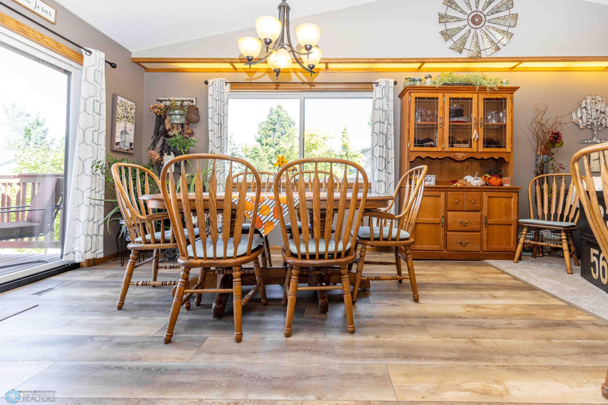 New laminate flooring, new window, in dining room