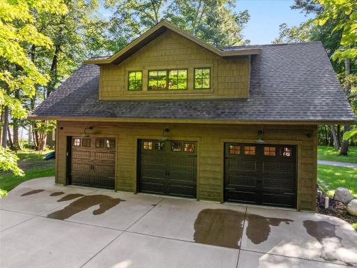 Heated 3 car garage with floor drains and epoxy floors.