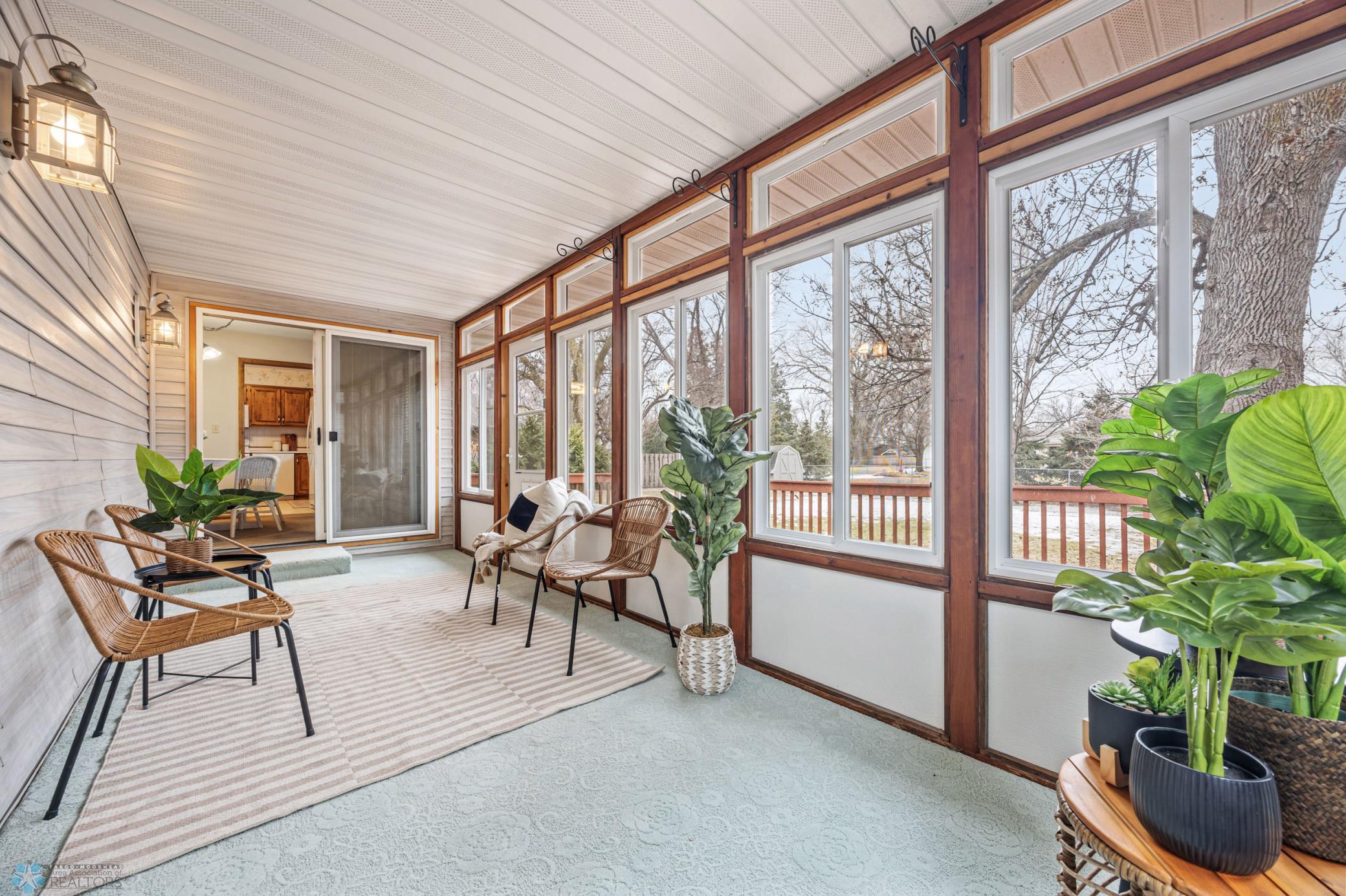 3 Season Porch- Access from Garage & Dining Room