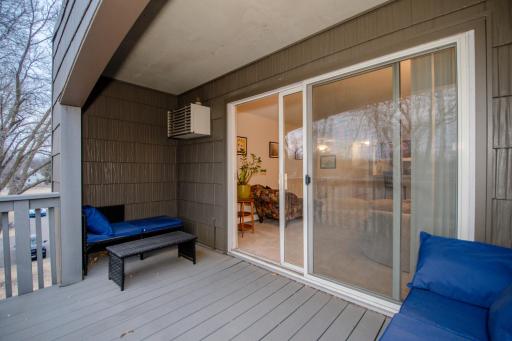 Large covered balcony with maintenance free decking.