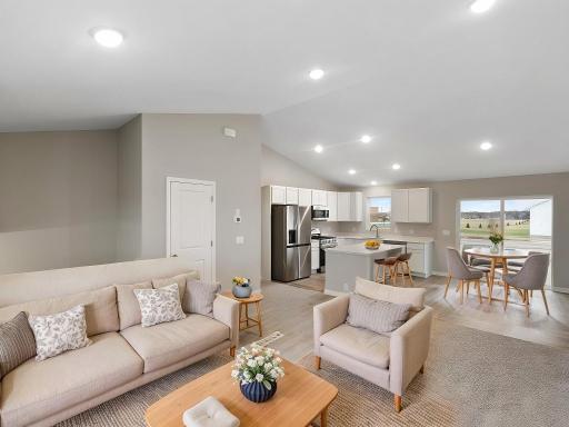 Living Room, Virtually Staged. Photo is taken of another home with similar plan and finishes.