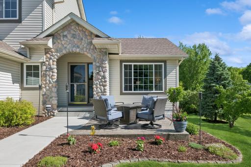 Welcome to 4514 McAllister! Great curb appeal and outdoor living spaces abound, including this welcoming stamped concrete front patio.