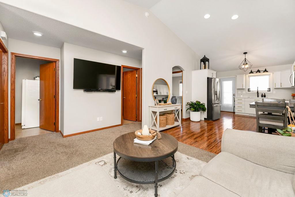 Living Room view to laundry and bathroom