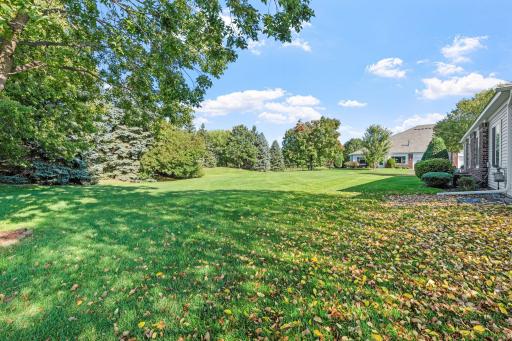 Enjoy your morning coffee on private patio overlooking endless green spaces