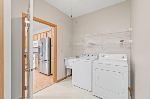 Laundry is a cinch & convenient storage room on main level