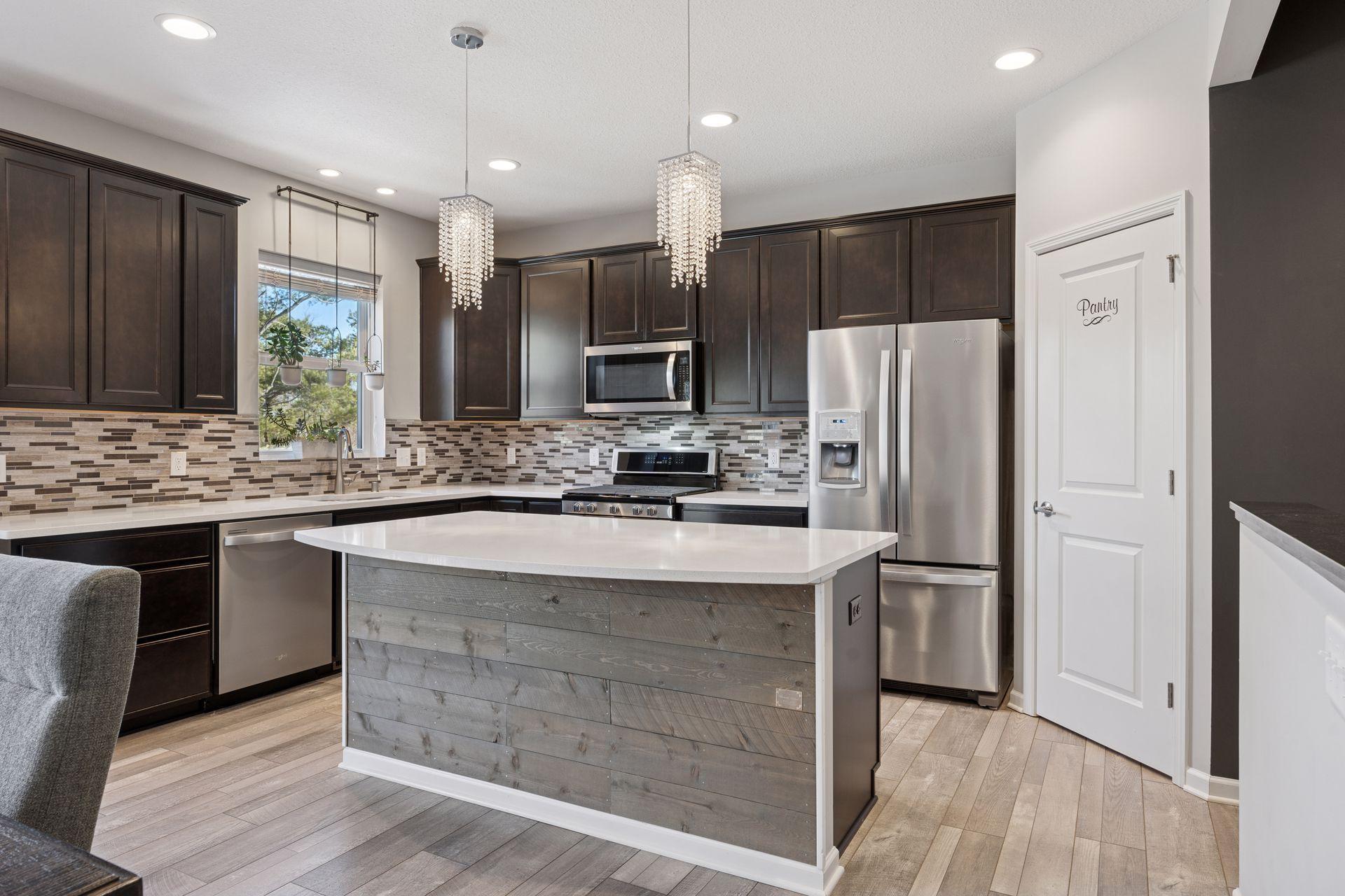 Perfect center island/breakfast bar with outlets and built-in garbage/recycling
