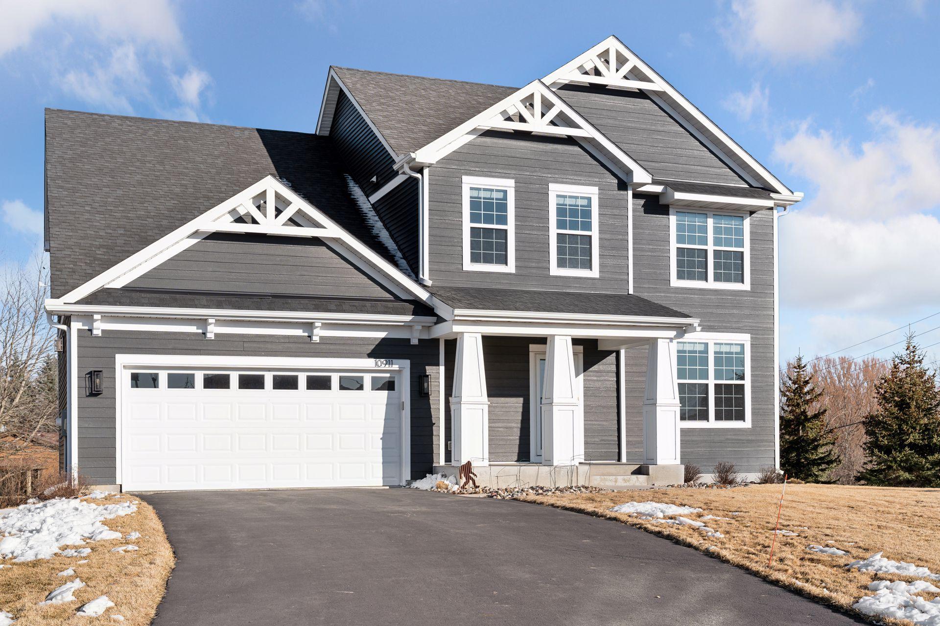 3 car garage - left side is 2 car tandem