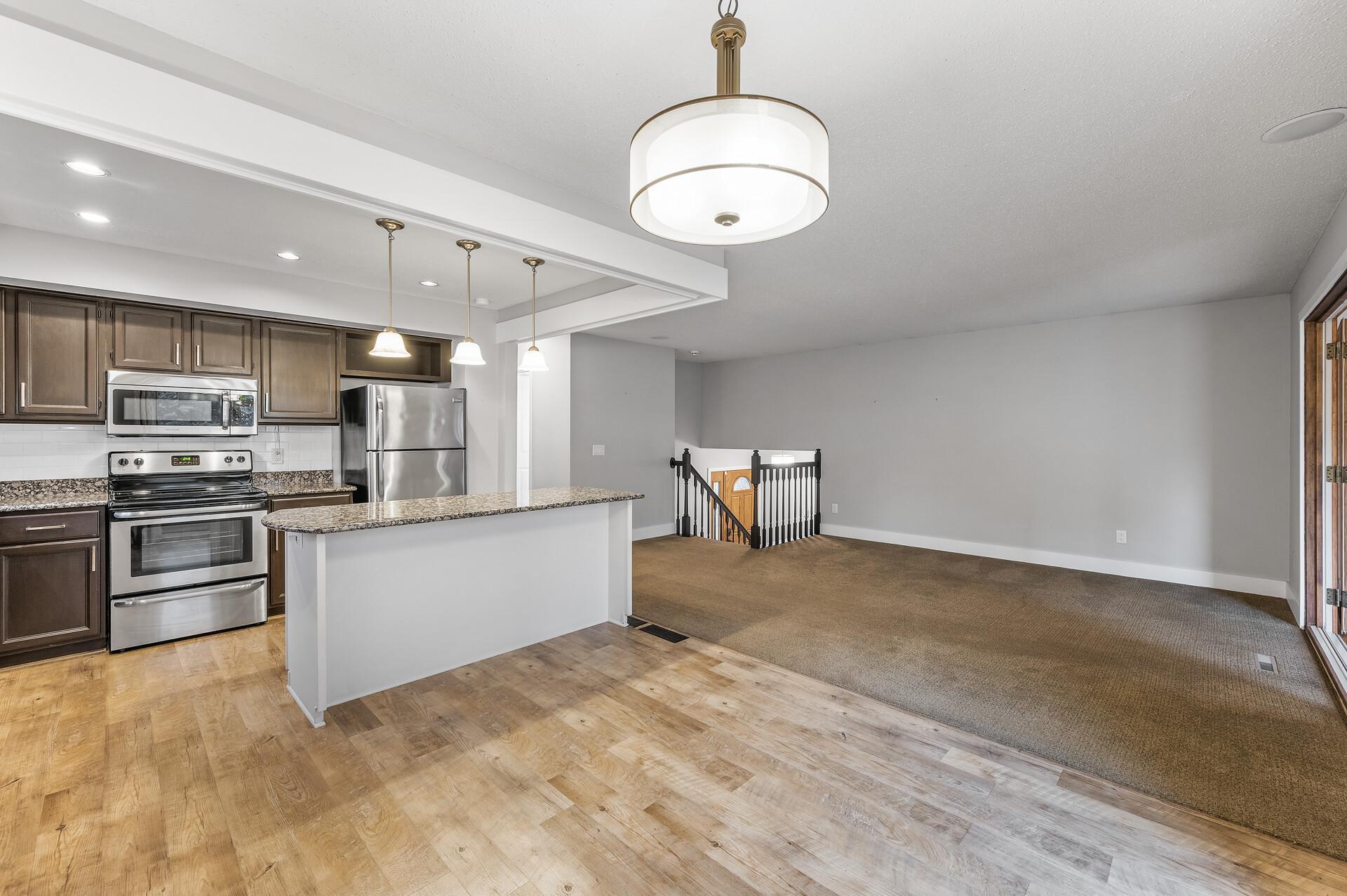 Center island offers additional seating options.