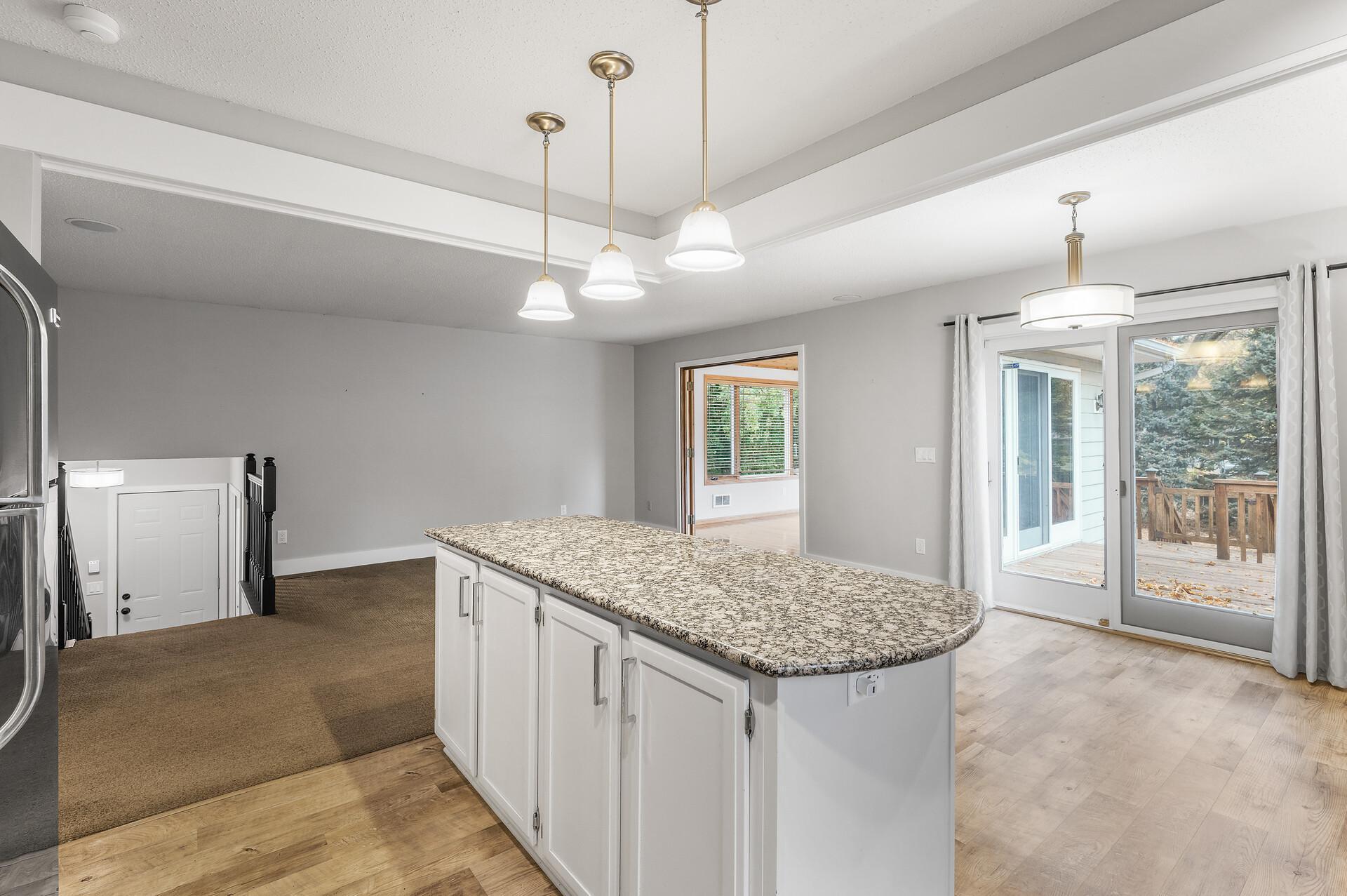 Another view of the main level showcasing deck access.