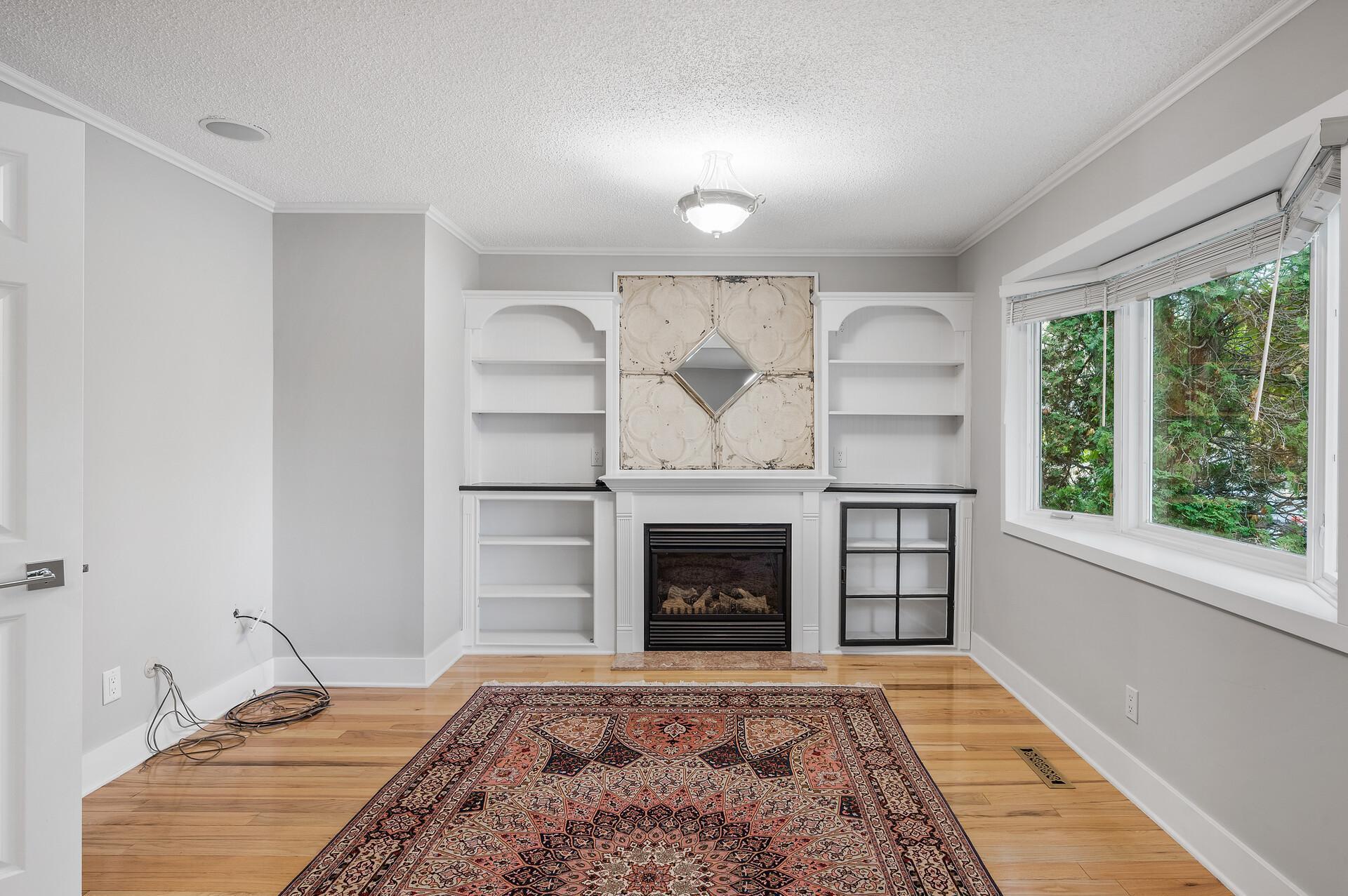 This extended primary suite makes for a perfect office, nursery or cozy reading and relaxing area.