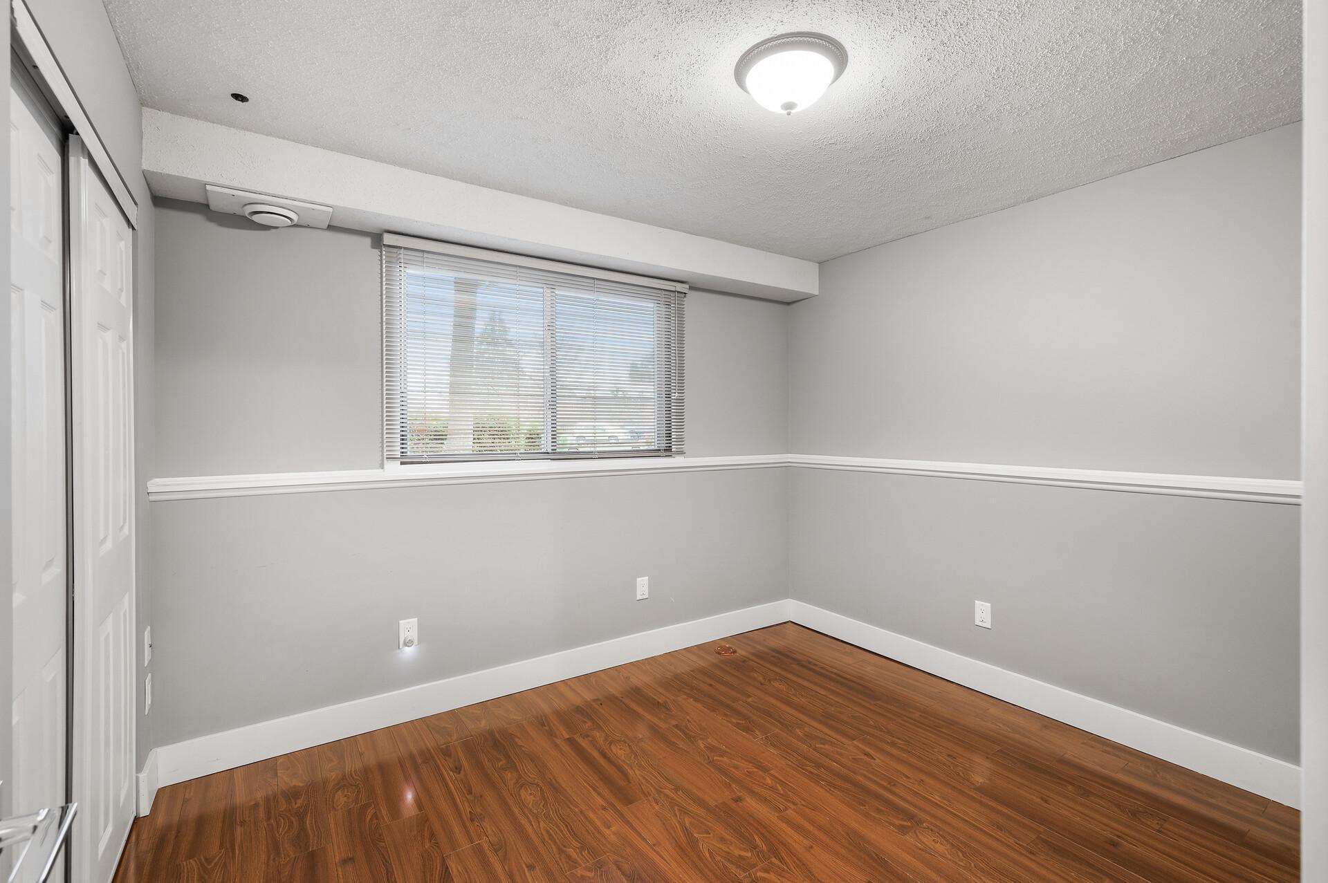 One of the two lower level bedrooms.