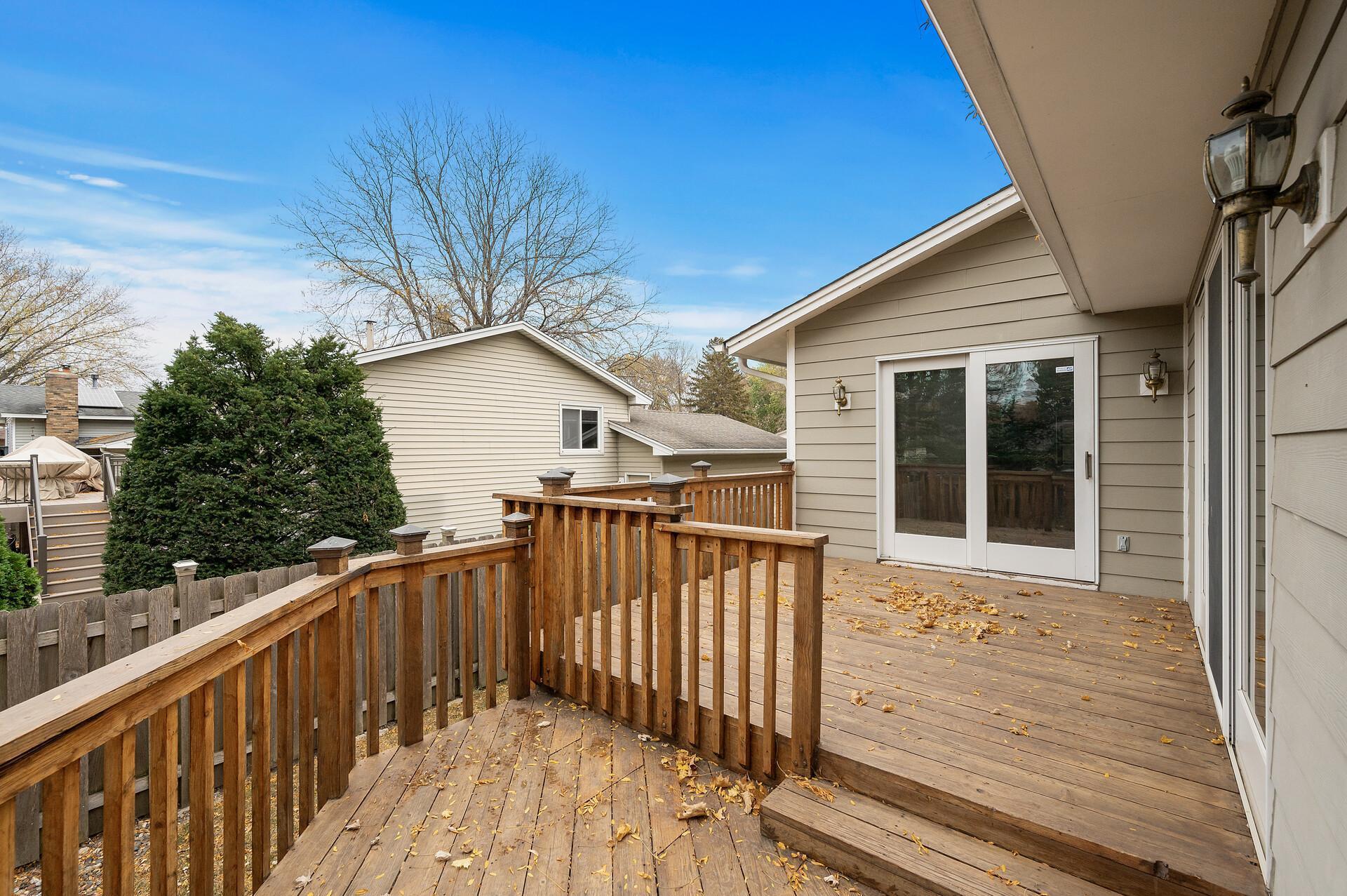 Two tier deck offers space for grilling, eating out or simply enjoying the seasons.