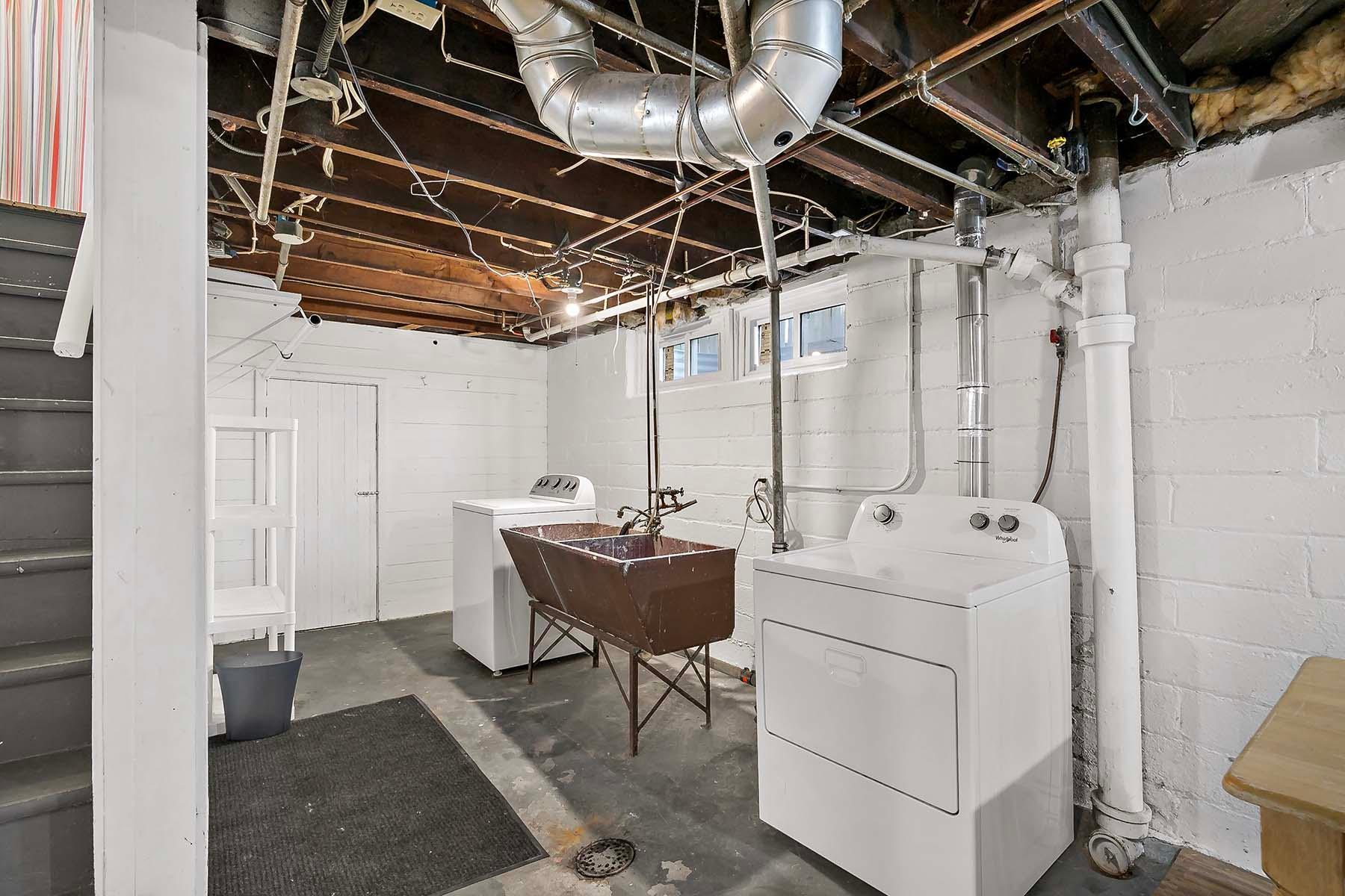 Washer and dryer included - large laundry area.