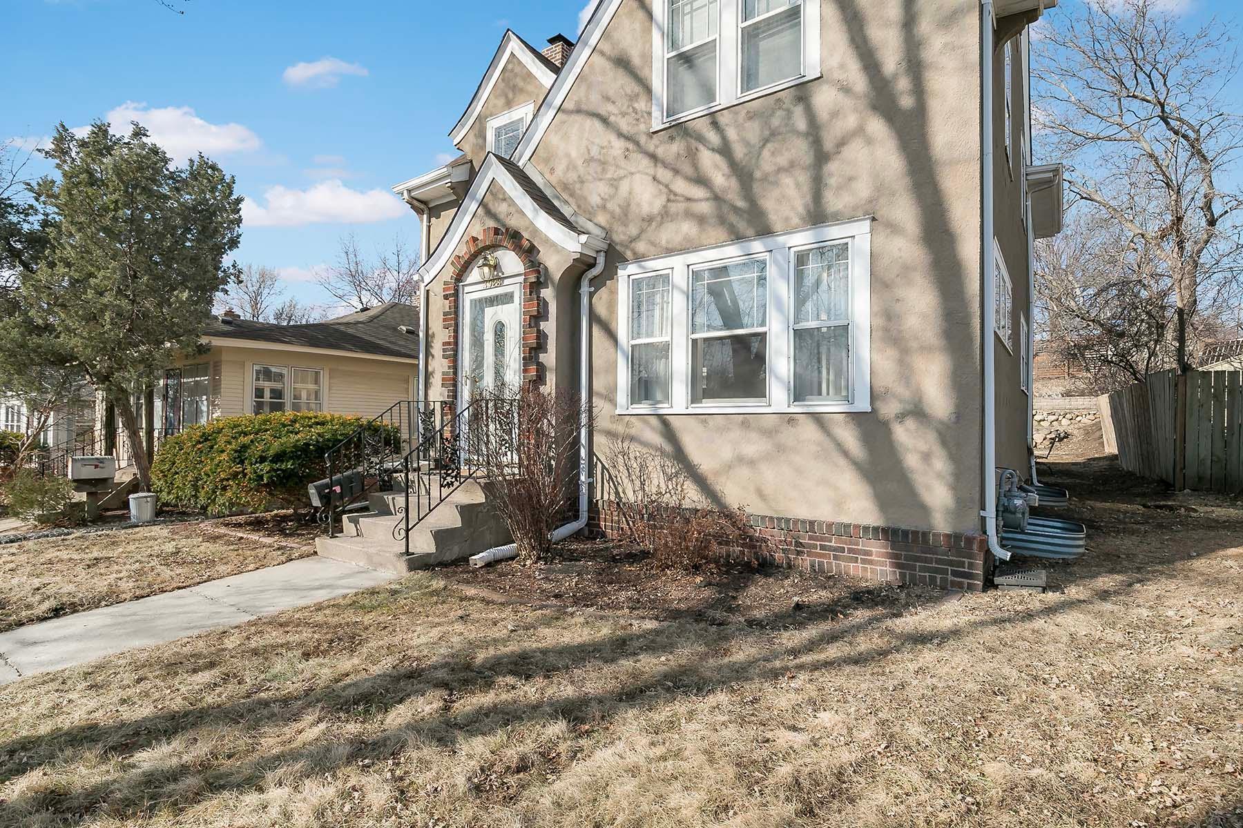 East-facing home with durable stucco exterior.