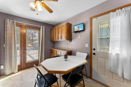 A buffet area with additional cabinets provides extra storage and prep space, adding to the home's functionality.