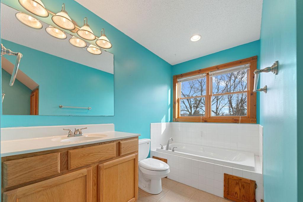 Soaking tub in primary suite
