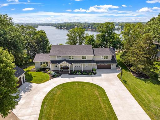 Welcome home to this exquisite luxury lake home situated on a private 3/4-acre lot at the end of a road on prime 100ft. of lakeshore on Lower Prior Lake's Kopps Bay.