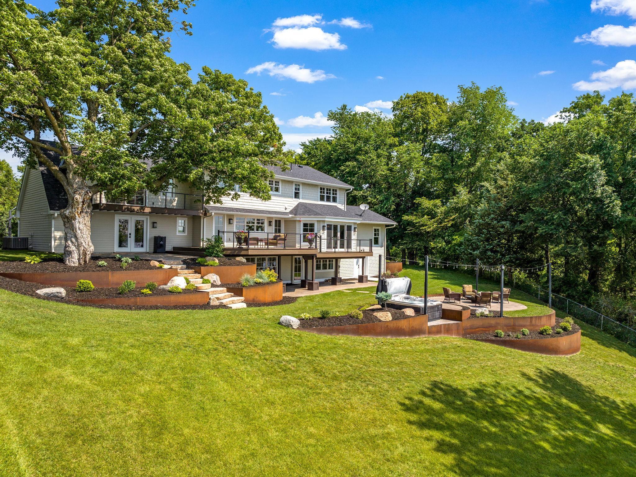 The retaining walls are made from Corten Steel which is long lasting and low maintenance. This is a rare opportunity to own one of the most private lots on Prior Lake.