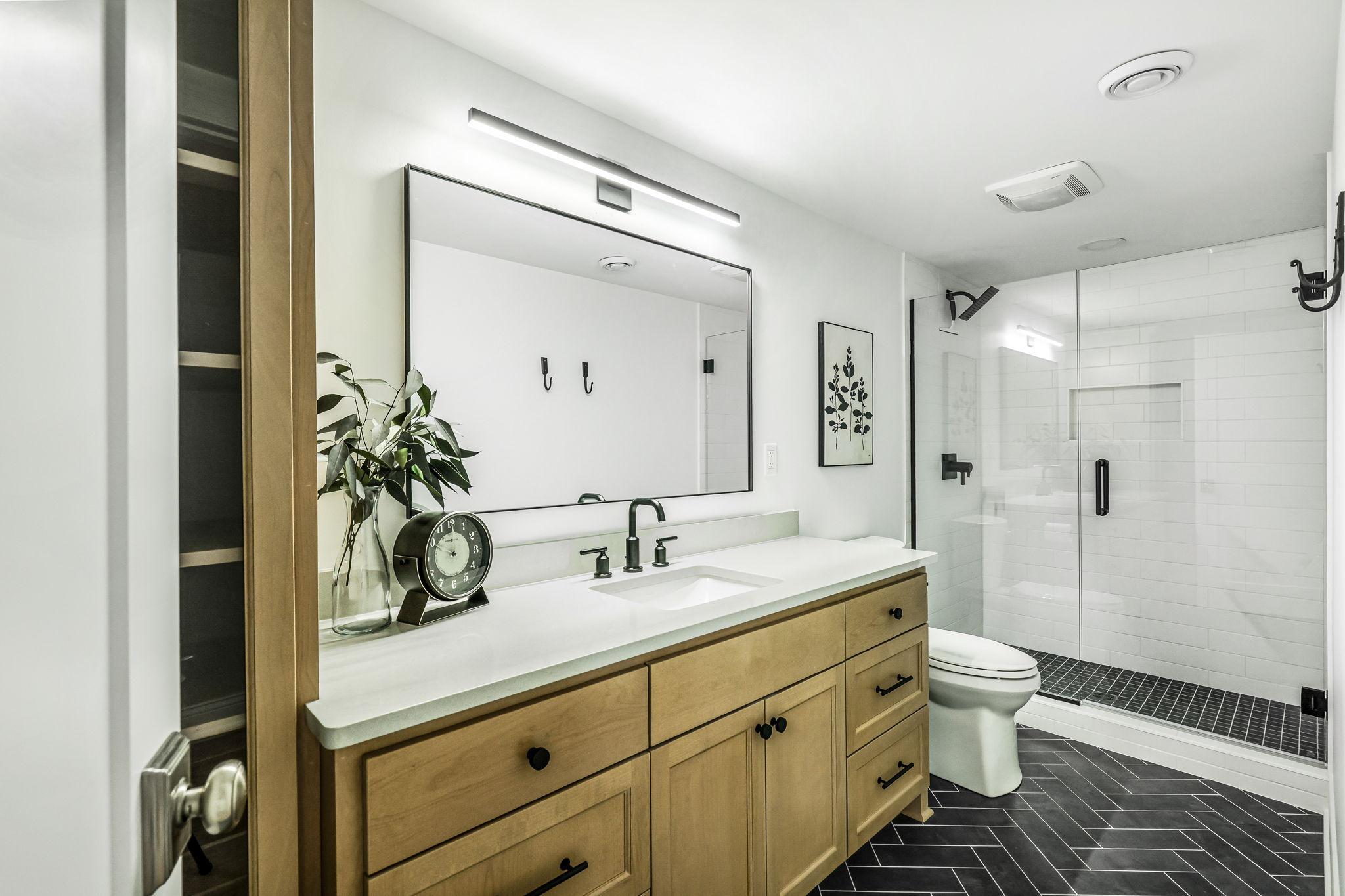 Stunning lower level 3/4 bathroom.