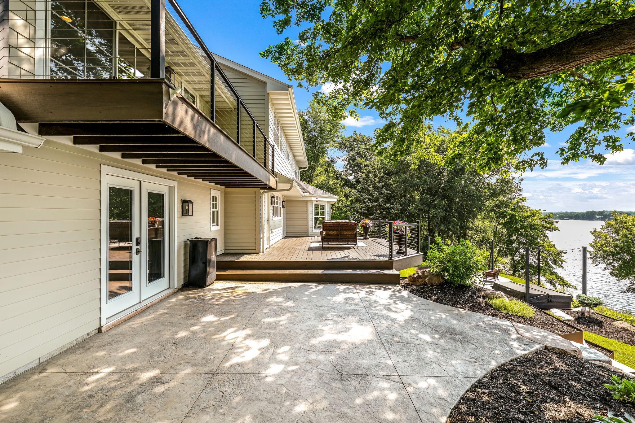 Brand new landscaping completed in 2020. Enjoy this huge stamped patio and large maintenance free deck. Irrigation system added in 2022.
