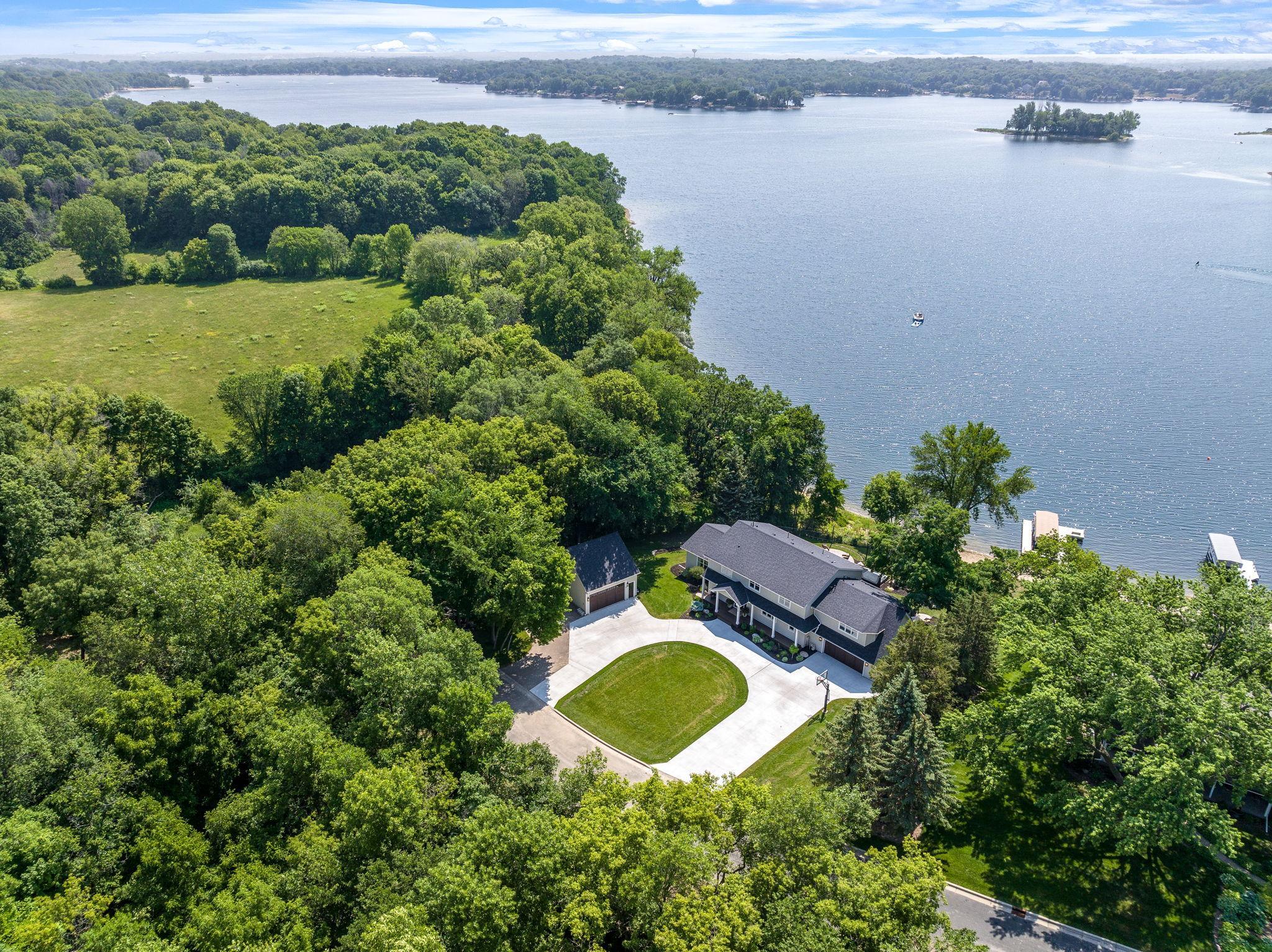This home sits on one of the largest and most desirable lots on Lower Prior Lake with million-dollar views. Nothing but privacy and incredible views. SO much space for guests to park, entertain friends and family and play!