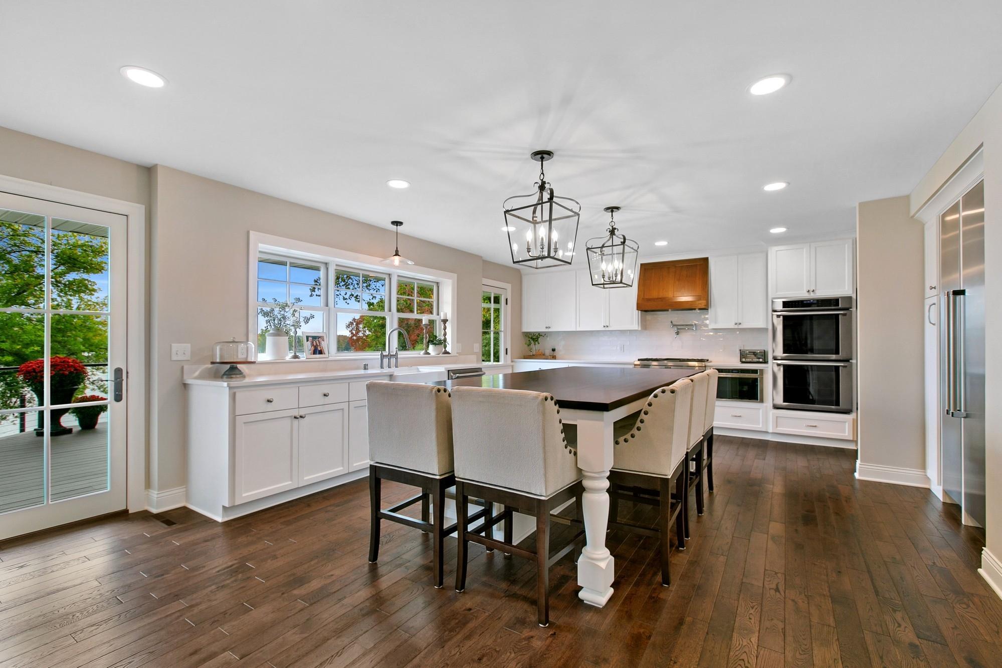 An expansive gourmet chef's kitchen awaits you! This space is absolutely wonderful for entertaining. Huge island, an abundance of storage and two pantries.
