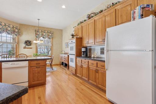 Kitchen features double-oven, pantry, Cambria countertops, cabinets galore!