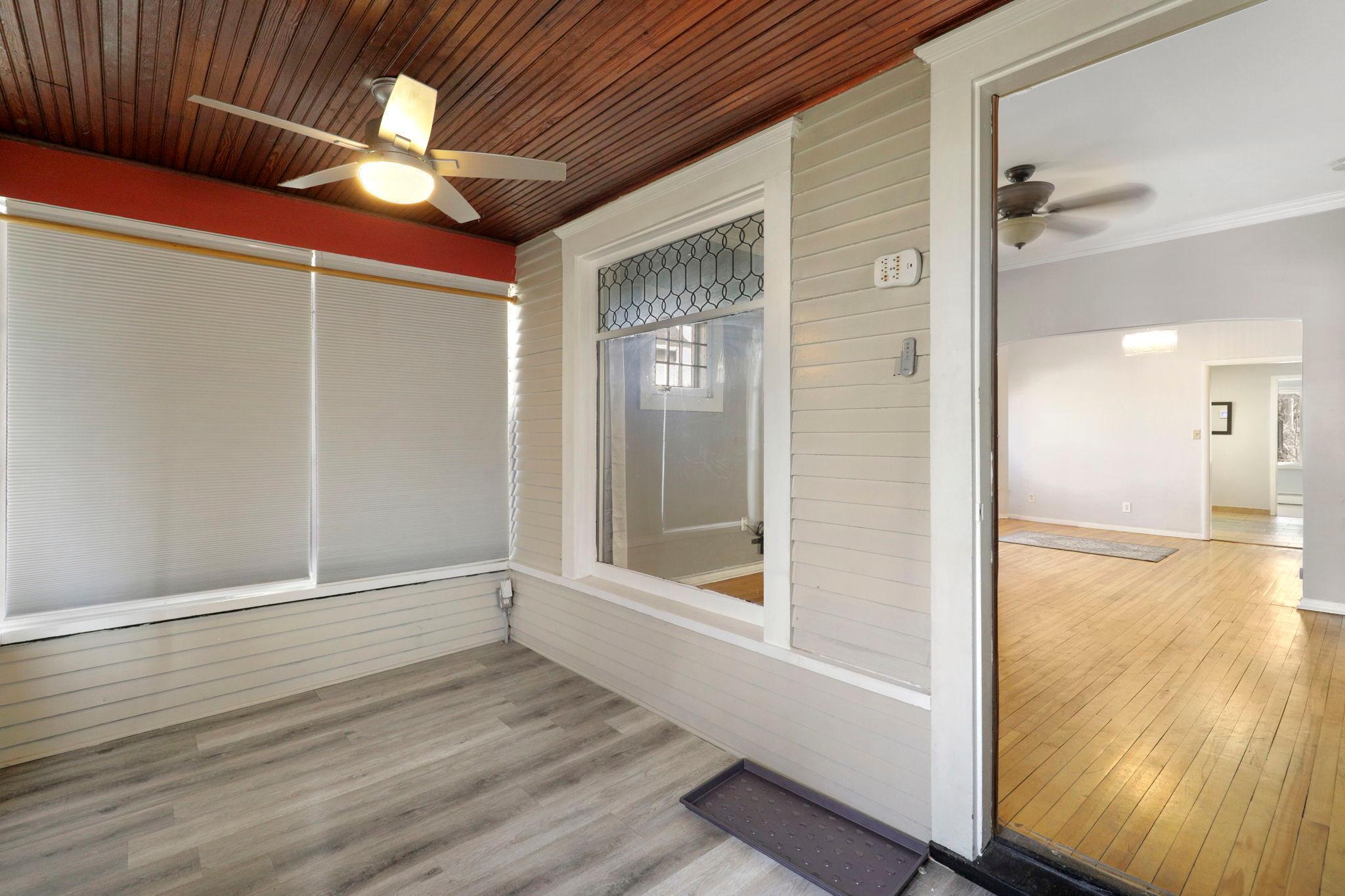 Enjoy bug free tranquility in the front porch.