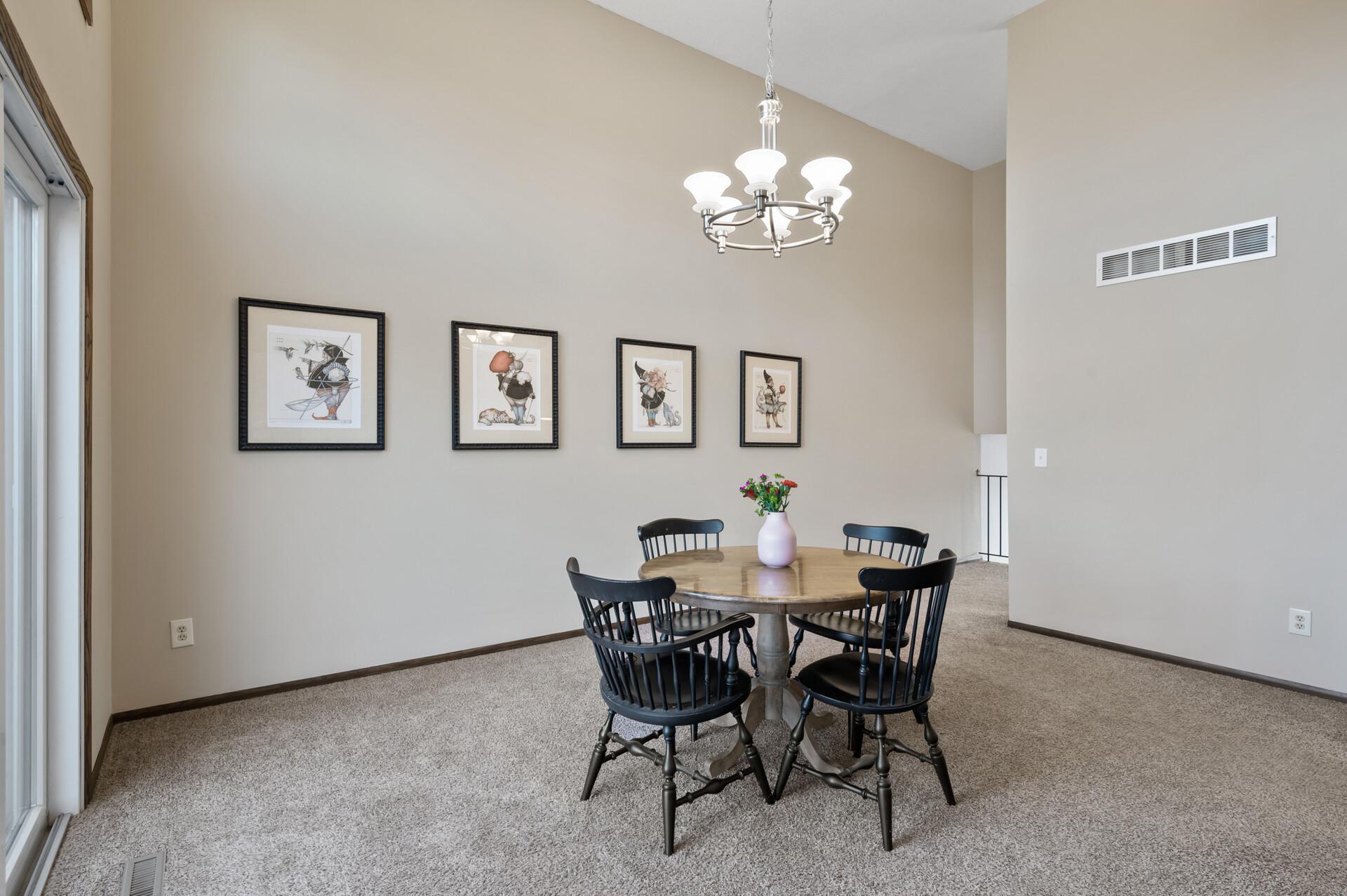 In this reverse view of the dining room you can see there is ample space for a larger table and a buffet cabinet or any dining room accessory you would like.
