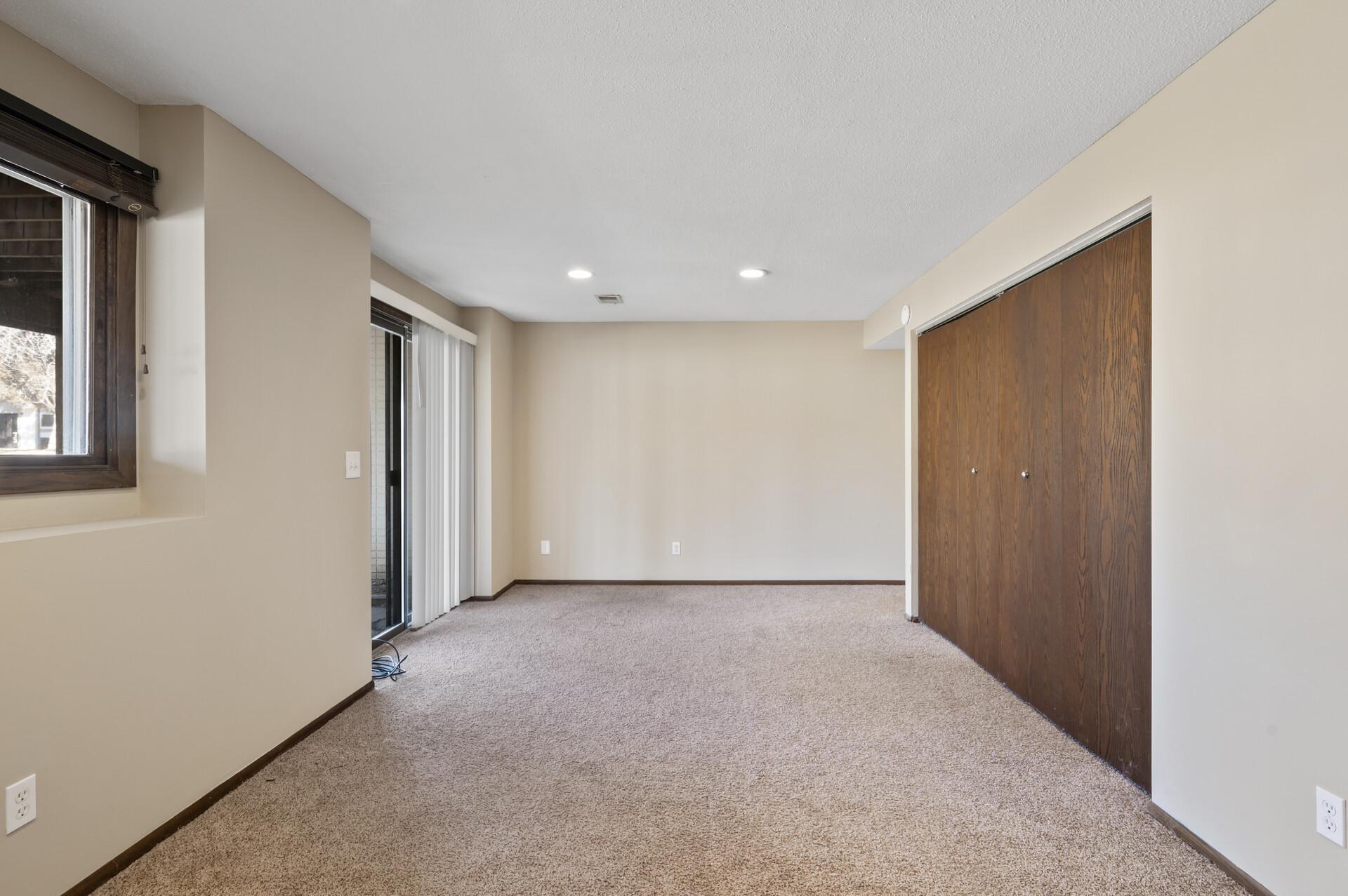 This space would make a great family room, playroom, workout room, or an office.