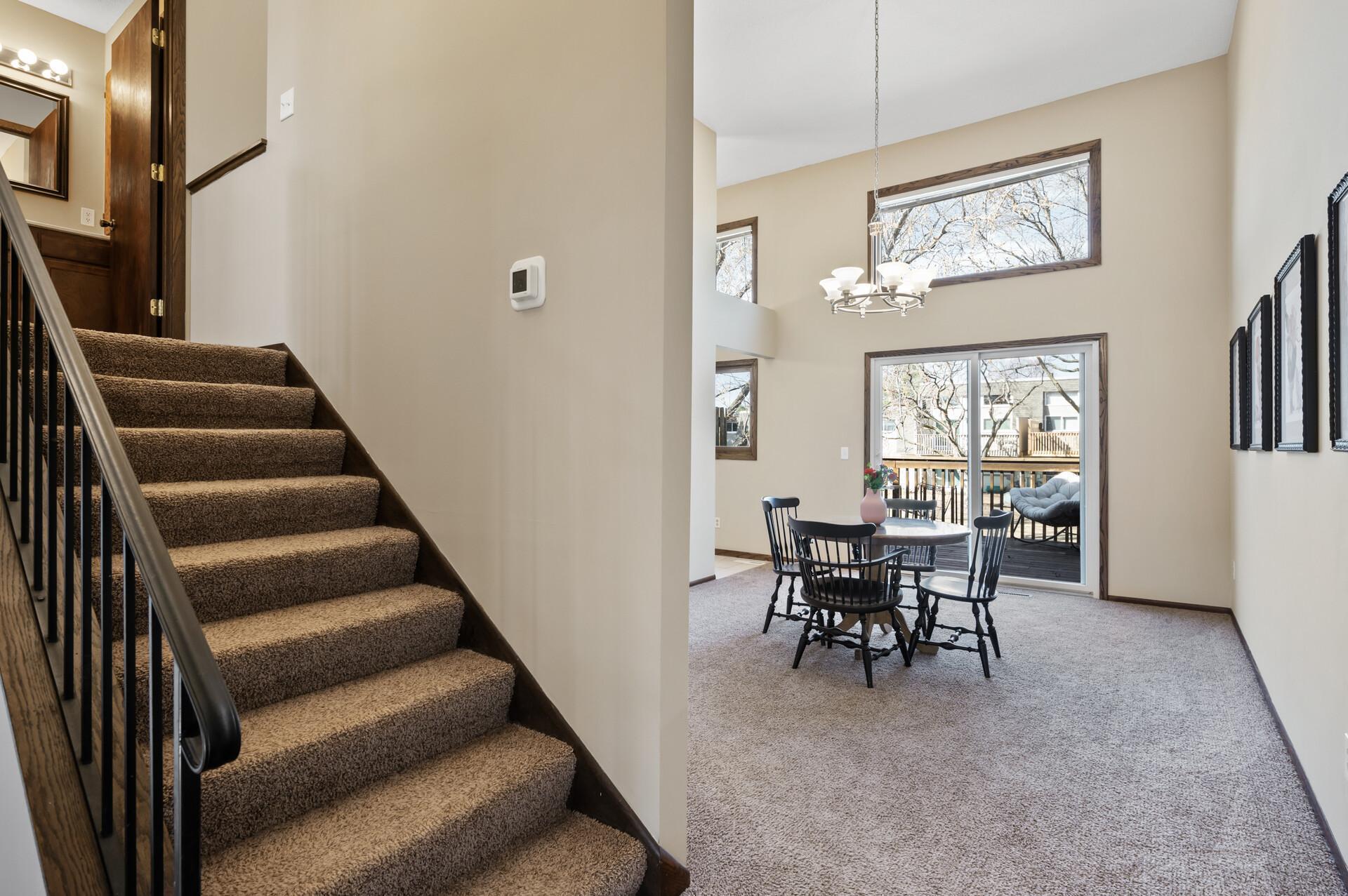 Here you can see the stairs that lead to the third level where you'll find 2 bedrooms and a full bathroom.