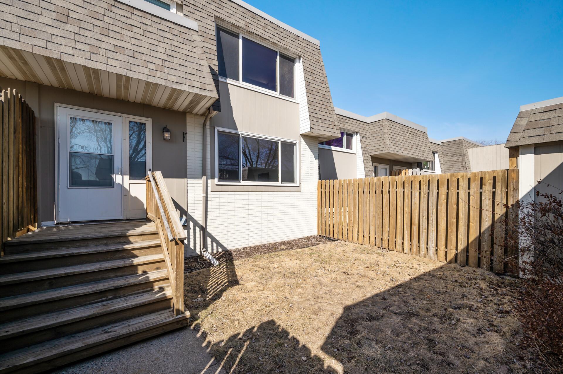 The front yard is fully fenced for privacy and a great space for children and pets to play safely.