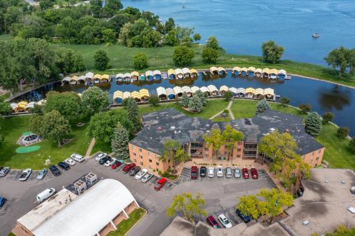 Plenty of parking for guests. Your boat slip is near the 3 pine trees in the center of the photo.