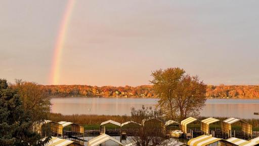 A beautiful fall photo! Enjoy the changing of the seasons and calm fall water with this view!