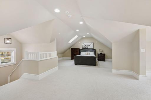 Expansive 3rd-floor bedroom, office, or playroom, also plumbed for potential 5th bathroom