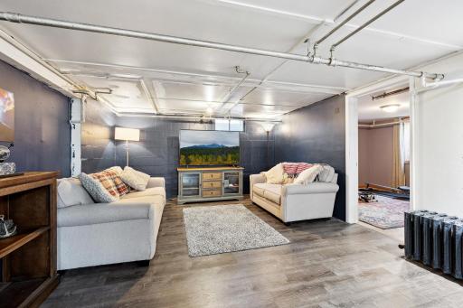 Lower-level family room with newer flooring