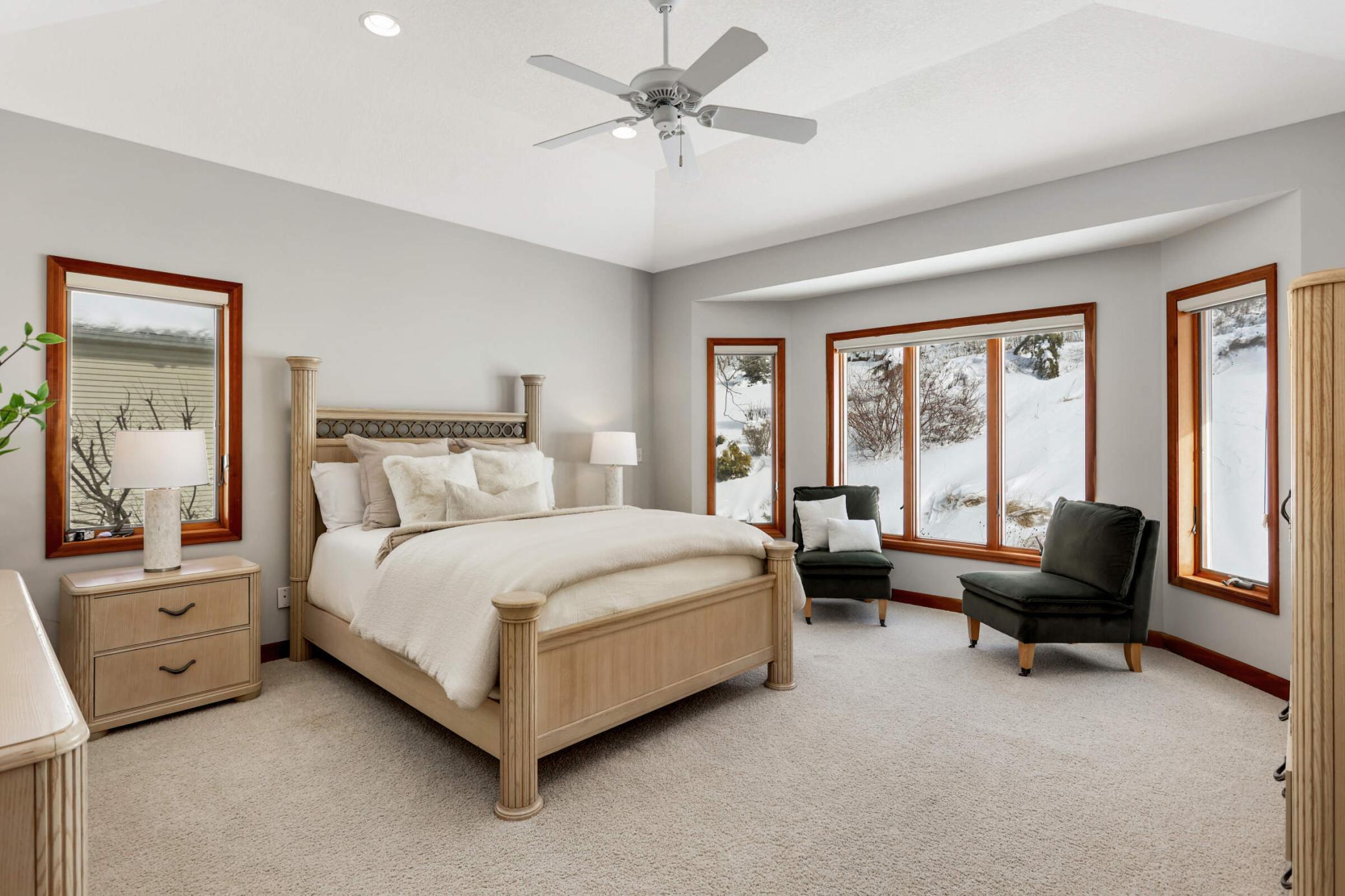 The owner's suite is a serene retreat, offering ample space to relax and unwind