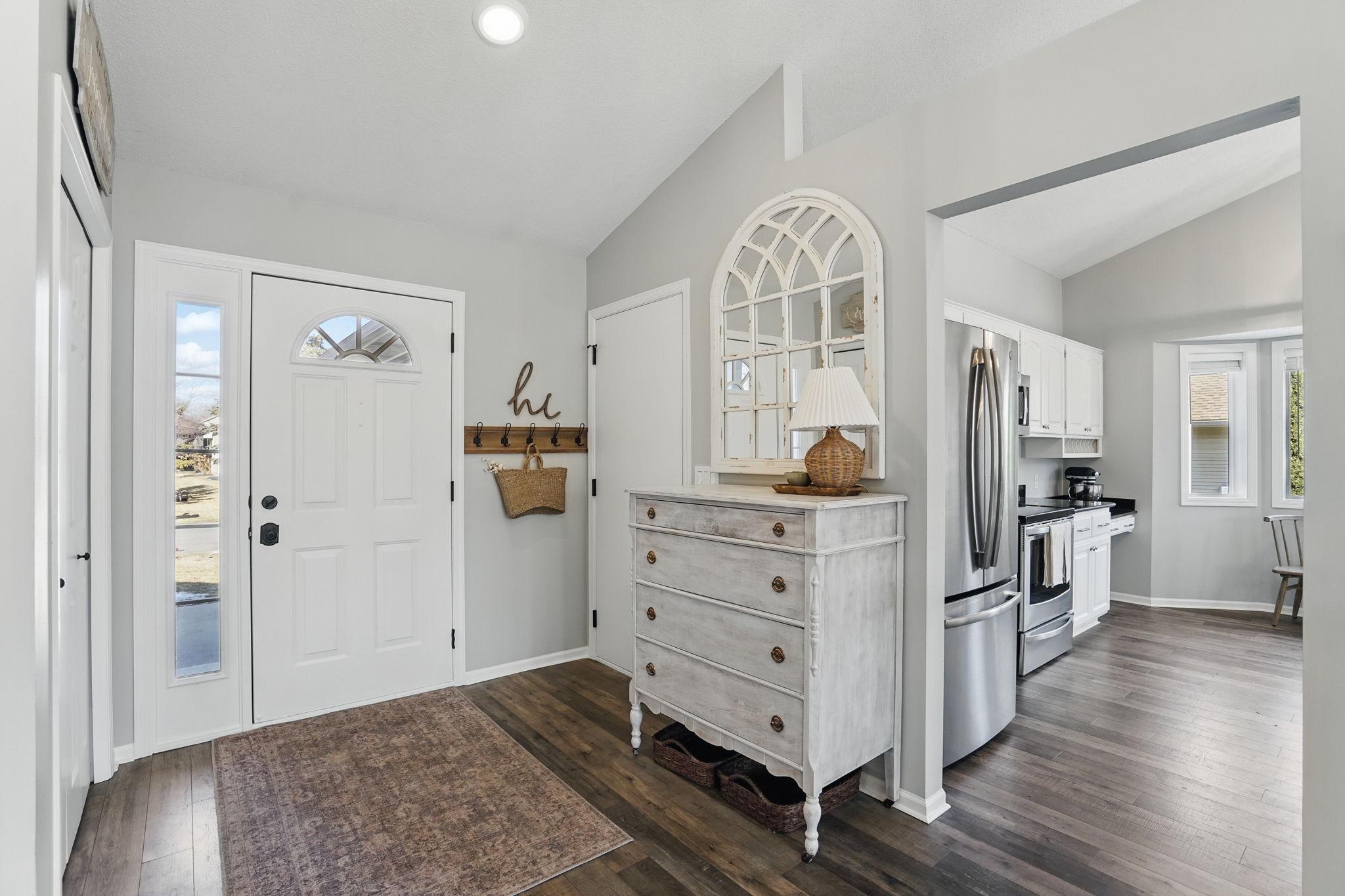 A welcoming foyer with side access from the garage